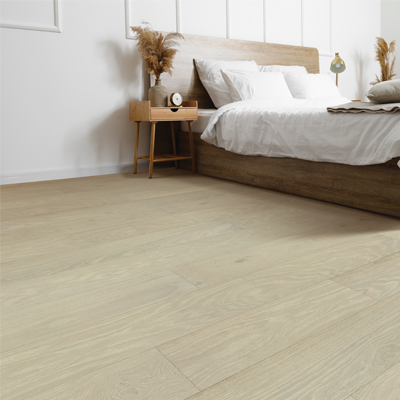 hardwood flooring in bedroom with coastal decor.