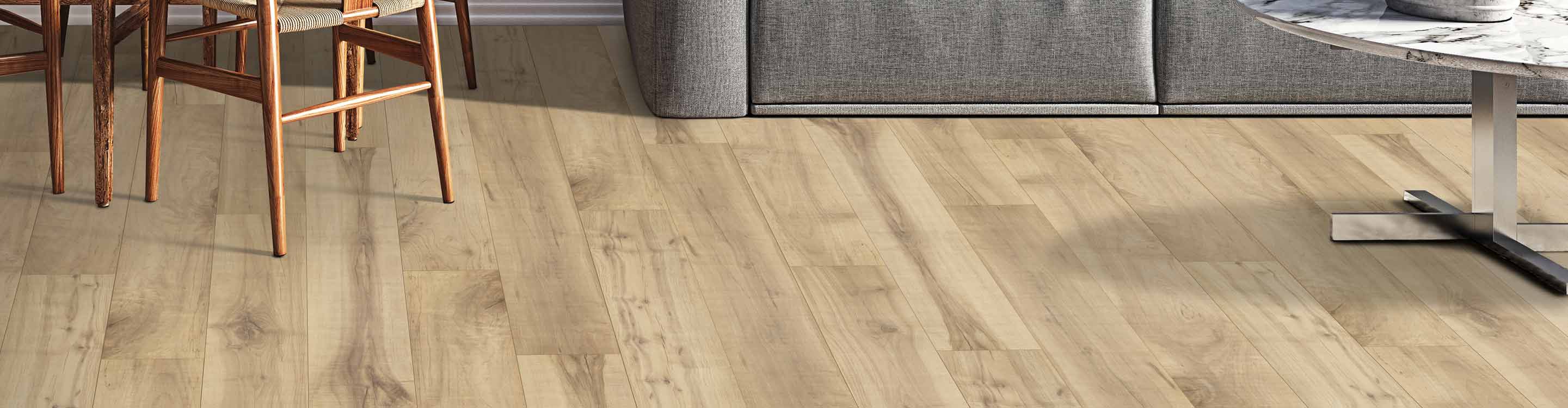 Wood-look vinyl flooring under furniture.